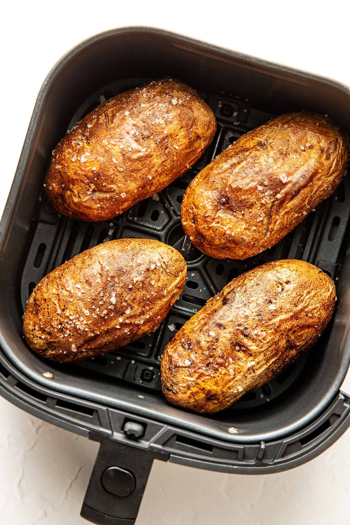 air fryer baked potatoes with flaky salt