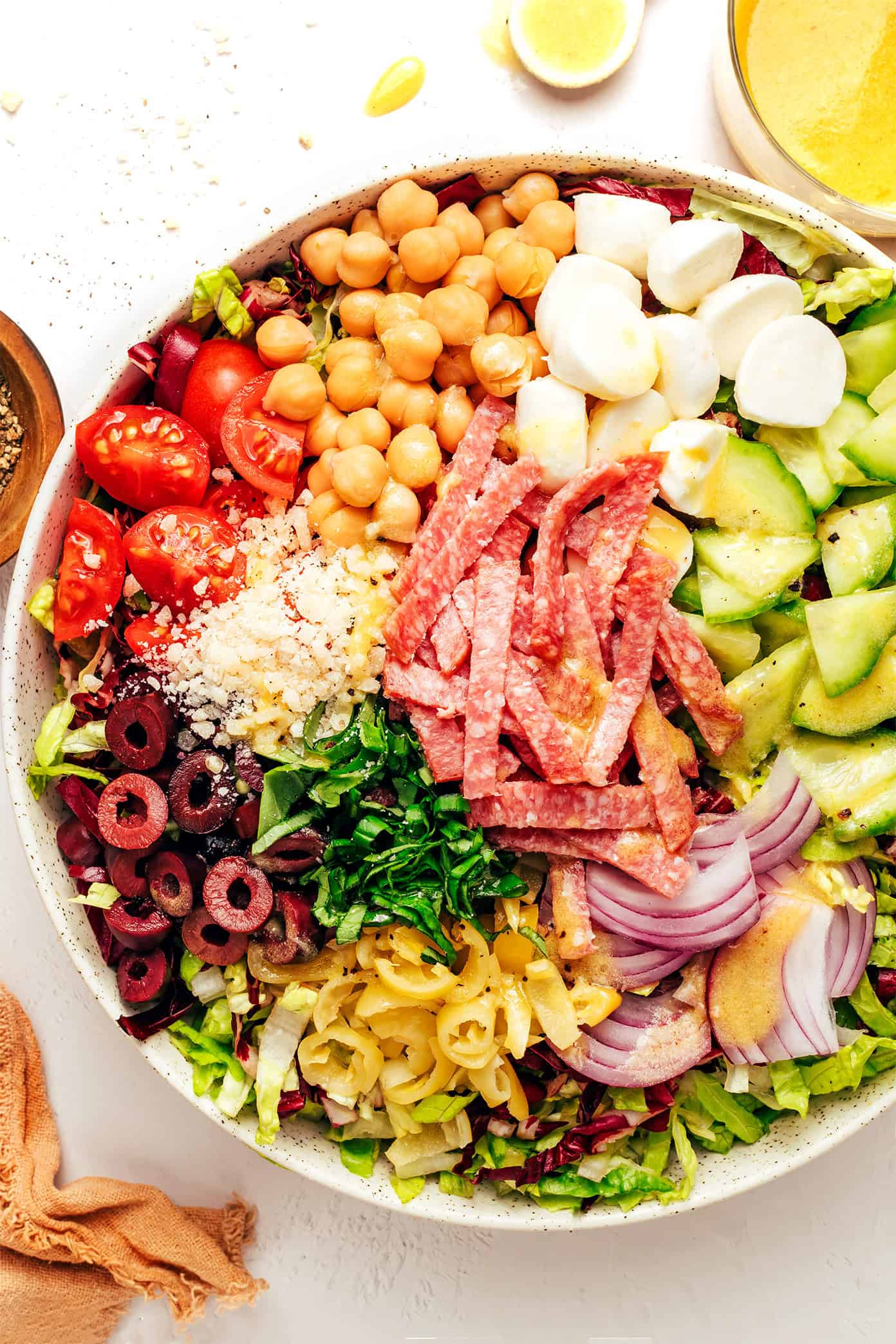 Assembling an Italian chopped salad