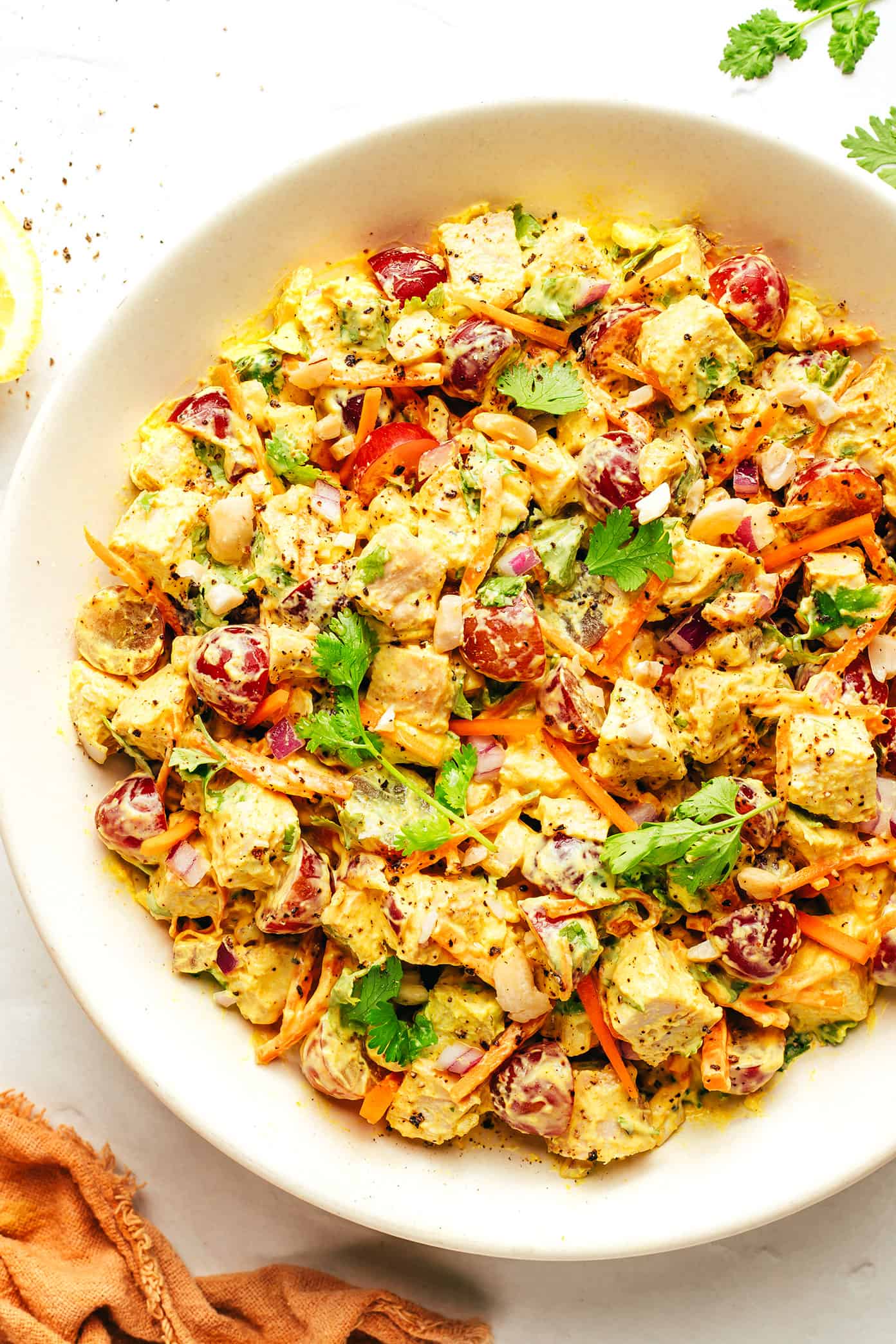 This copycat Trader Joe's curry chicken salad recipe is made with diced chicken, grapes, carrots, cashews, red onions, and a creamy Greek yogurt curry sauce. Serve in sandwiches, lettuce wraps, with crackers for dipping, or whatever sounds good! It's a high protein recipe that's perfect for meal prep and always hits the spot. | gimmesomeoven.com Trader Joe's curry chicken salad copycat