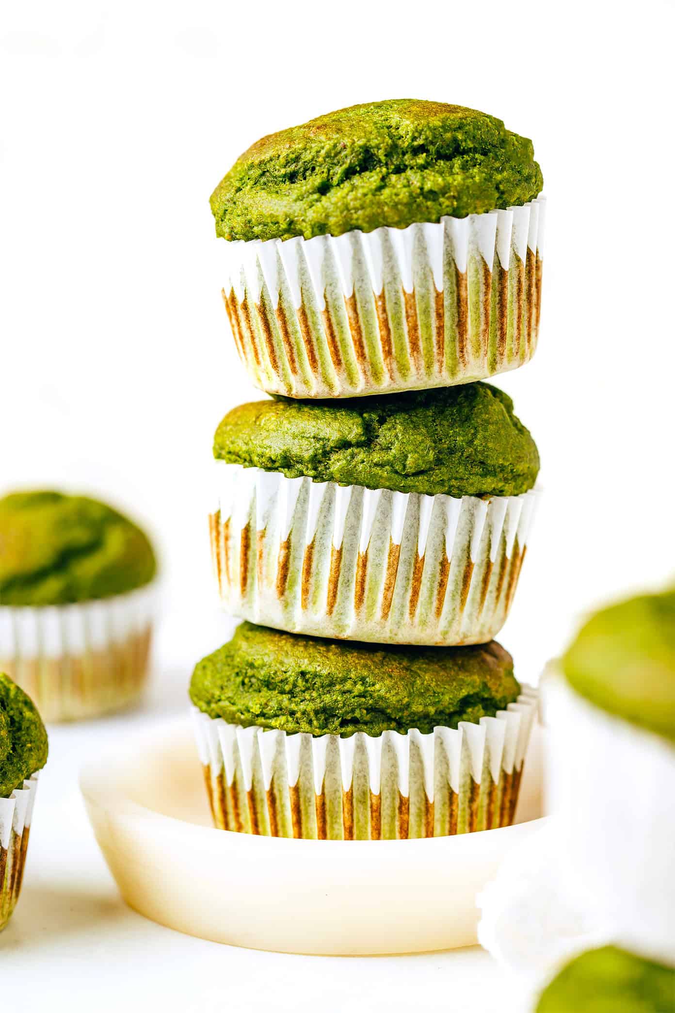 green muffins in a stack