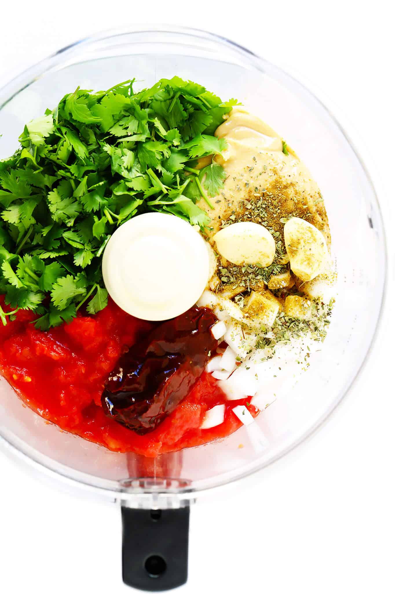 Ingredients to make Peanut Chipotle Salsa in a food processor