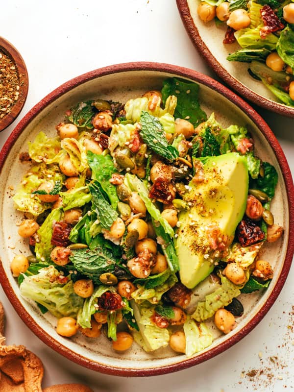 Chickpea date and avocado salad in bowls